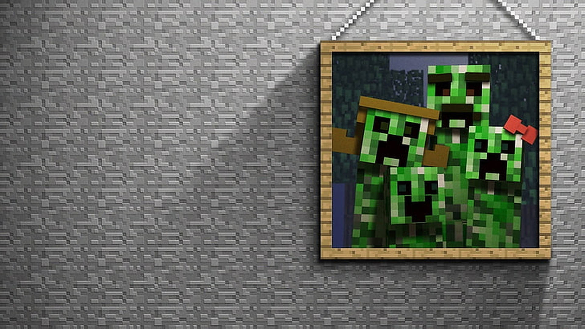裱框嘅Minecraft爬行者像素藝術掛喺灰色方塊牆上。
