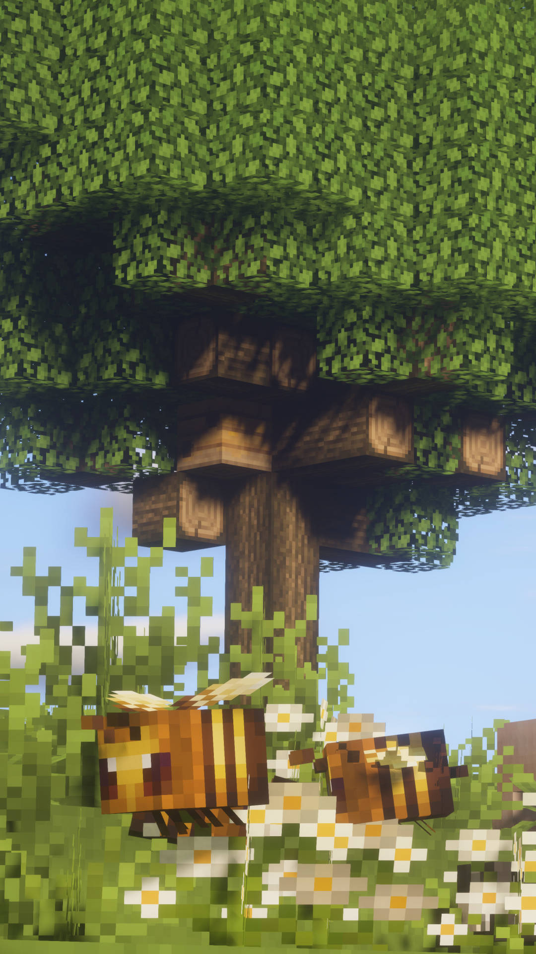 我的世界蜜蜂樹下 壁紙 — 像素化蜜蜂喺Minecraft風格草地嘅塊狀樹下靠近雛菊徘徊。