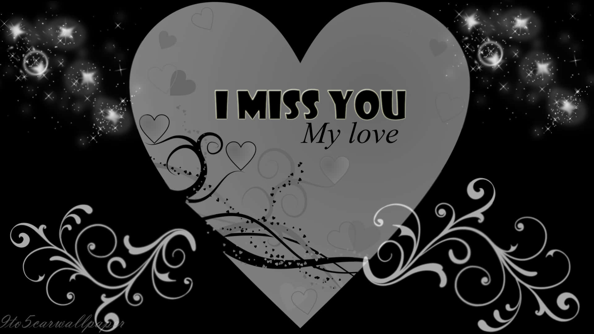 一個灰色心形，上面有文字 I miss you my love，周圍環繞著星星和漩渦。