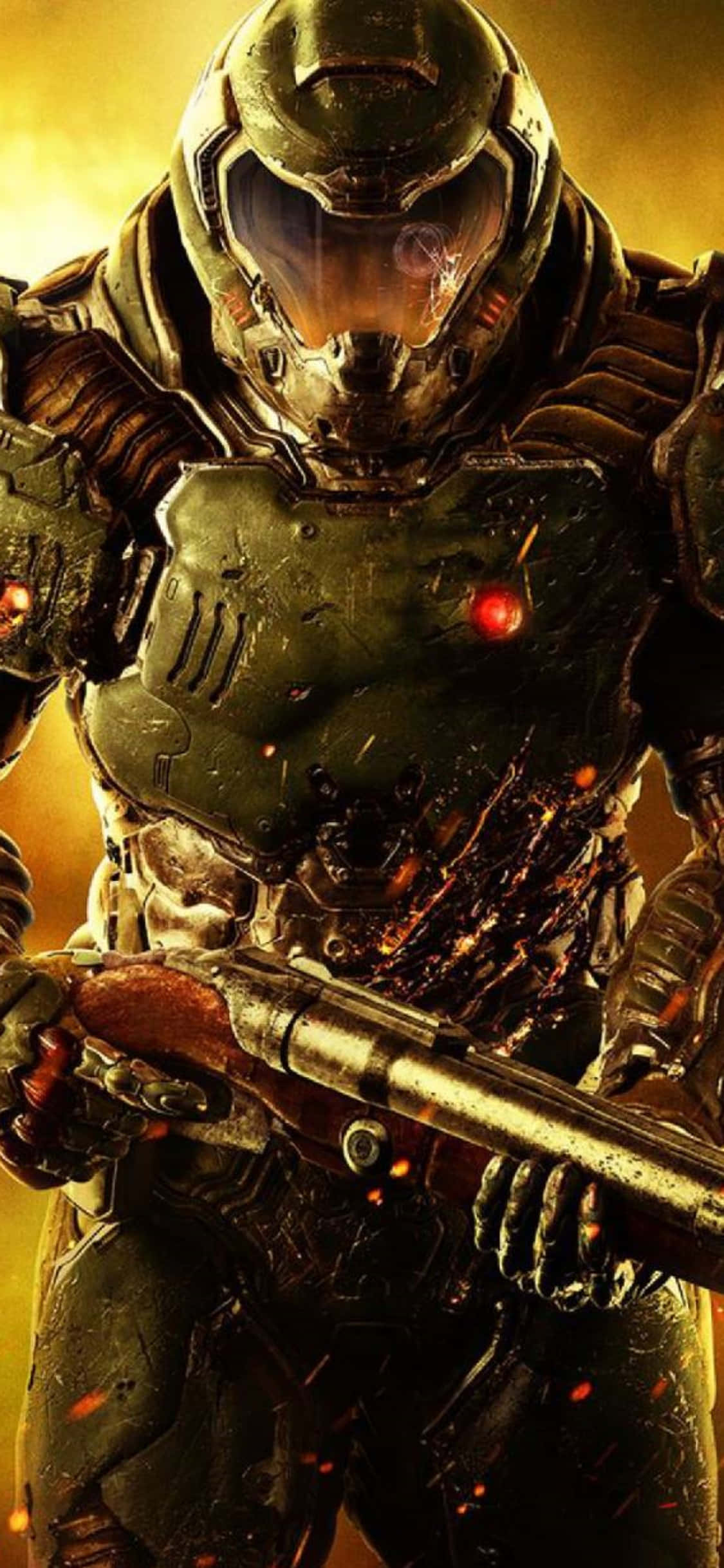 戰鬥服 DOOM iPhone XS 背景 壁紙 — 一名身穿重甲、眼睛發出紅光的士兵，手持霰彈槍，站在火花四濺的熾熱金色迷霧中。