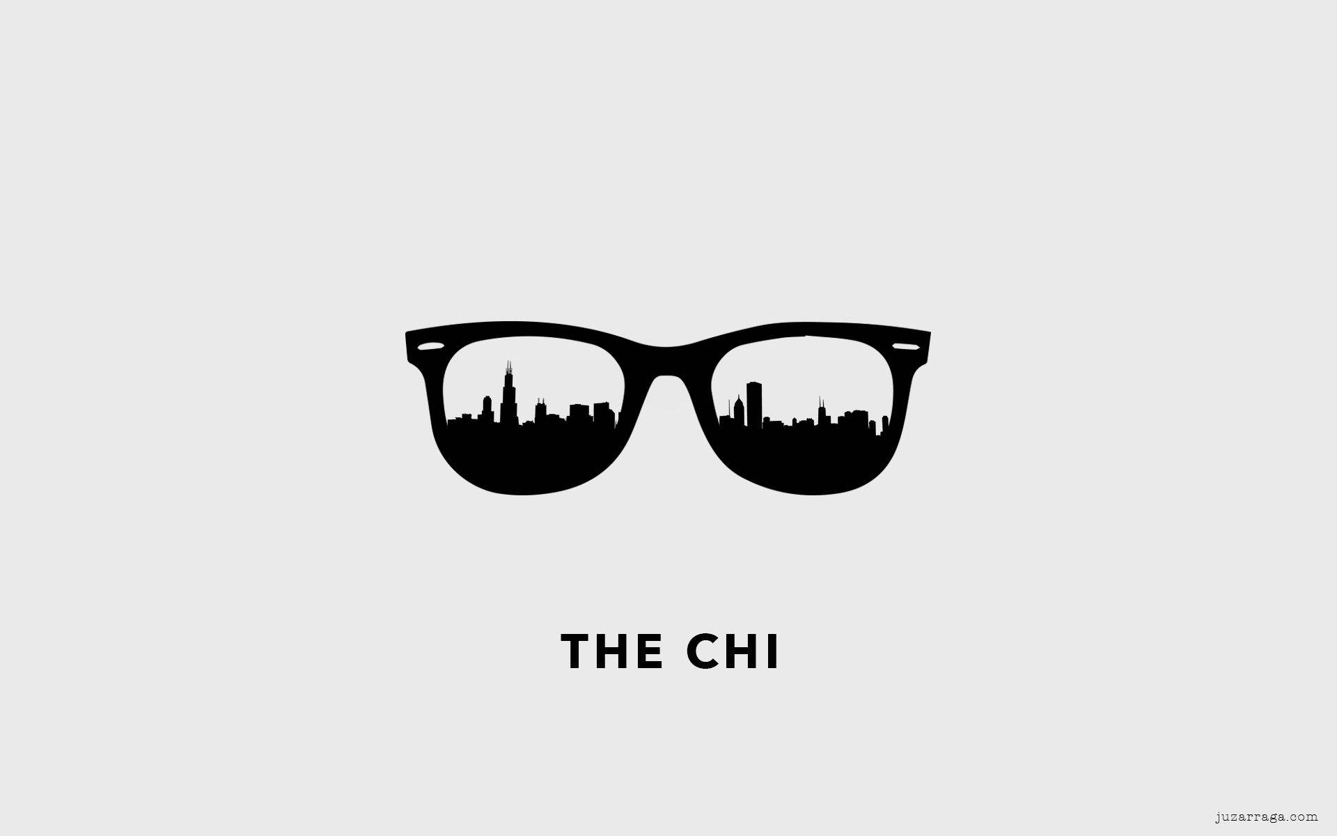 黑色太陽眼鏡，鏡片內有芝加哥天際線，灰色背景，文字 THE CHI。