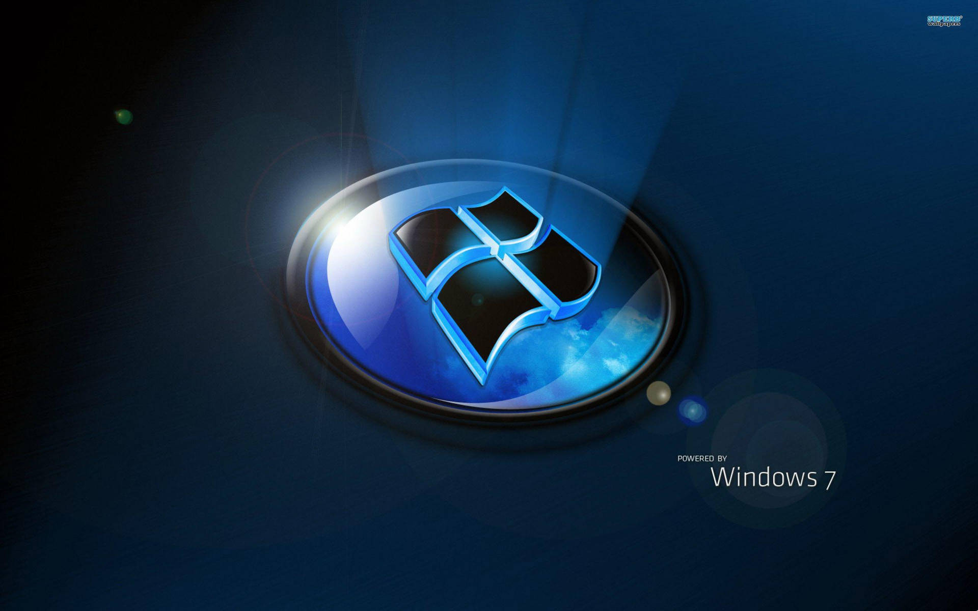 Windows 7 標誌在深色背景上帶有發光藍色亮點和鏡頭光暈。