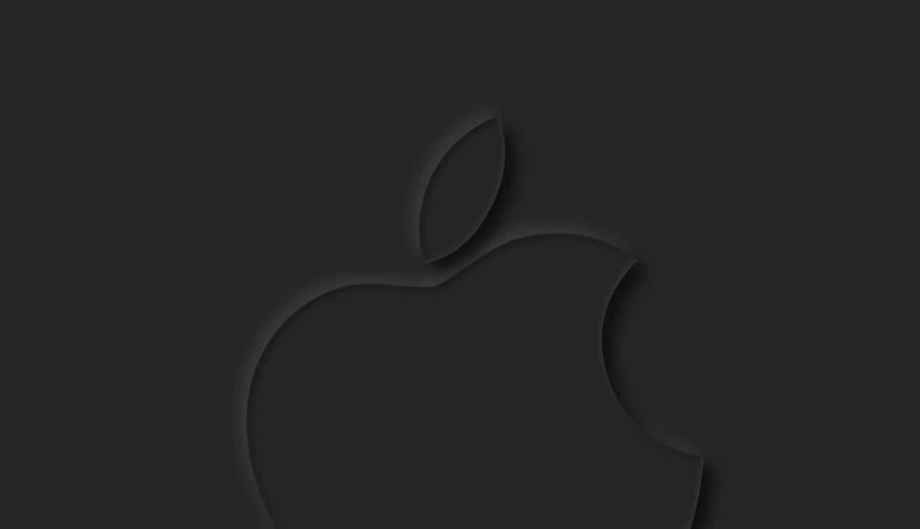 深灰色Apple標誌輪廓，帶有柔和陰影效果。