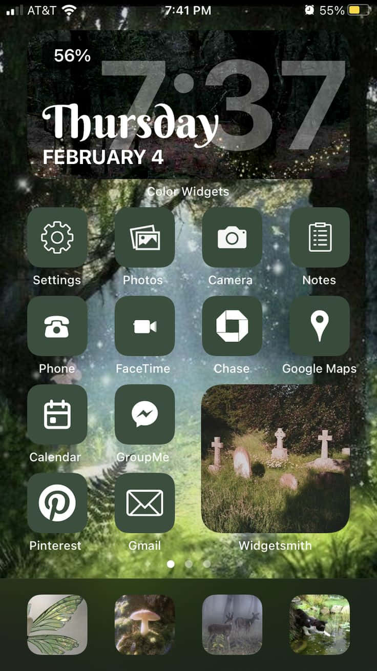 iPhone風格壁紙 桌布 壁紙 — 手機主屏幕，帶有黑暗森林壁紙，顯示在暮色天空下發光的燈光和墓碑。