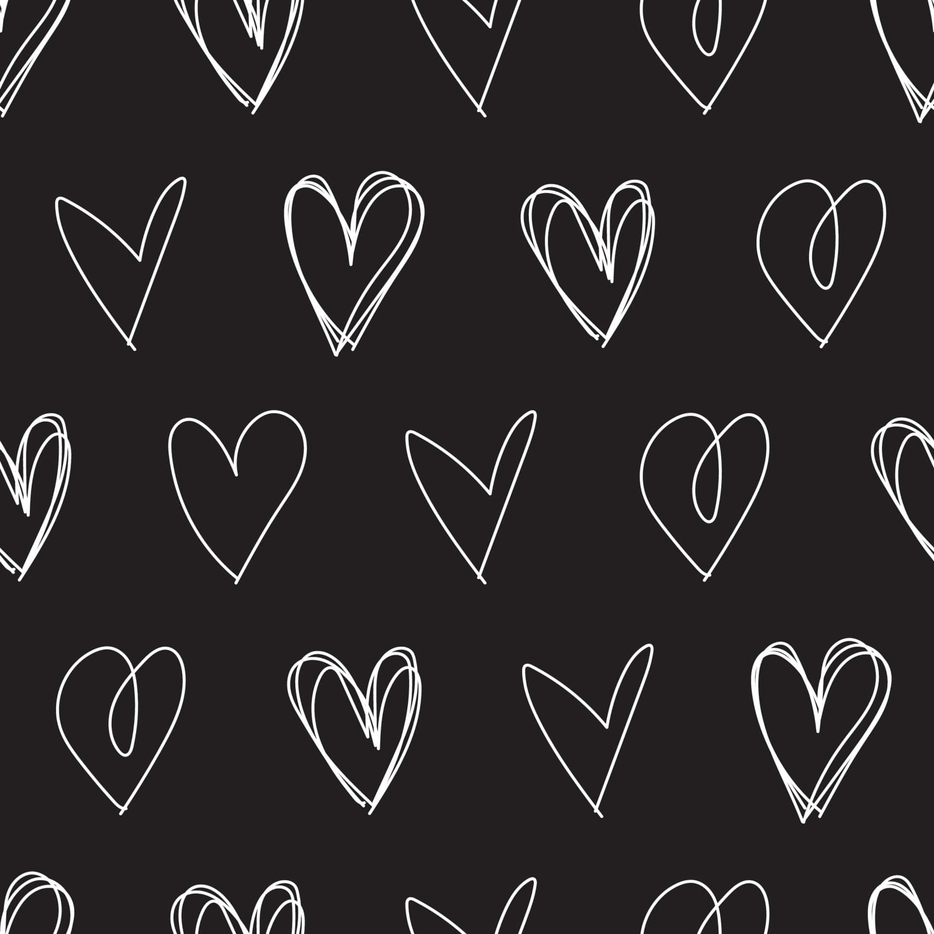 Black And White Heart 桌布 壁紙 — 手繪白色心形輪廓散落在純黑色背景上，形成重複圖案。