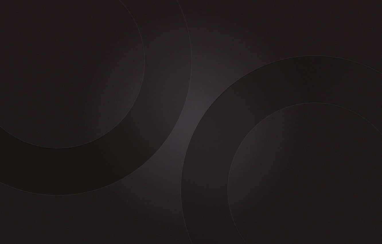 Dark Circles 桌布 壁紙 — 抽象深色牆紙，帶有柔和漸變圓圈，營造簡約寧靜的視覺質感。