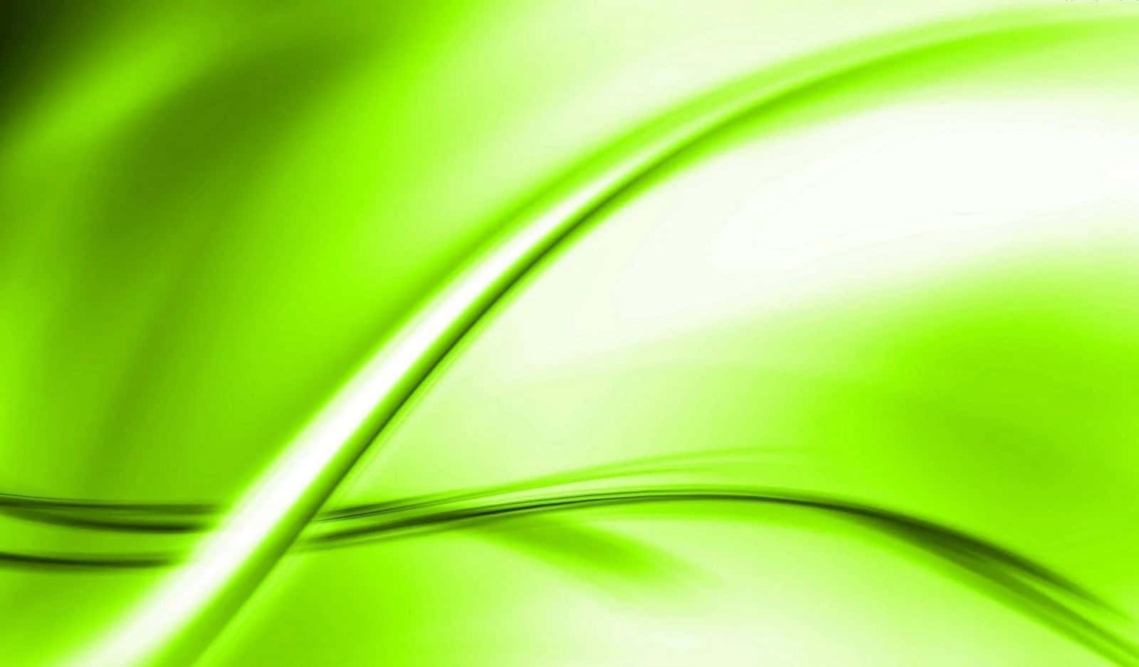 帶有發光高光和柔和漸變的動態綠色抽象波浪。