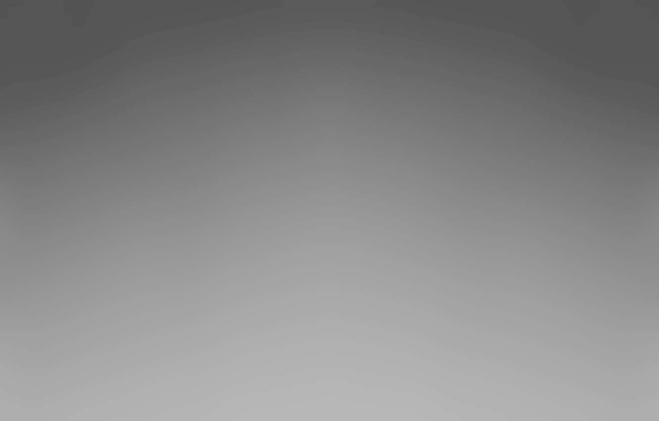 抽象灰階背景 壁紙 — 一個極簡的漸變，柔和灰色調從深到淺在整個畫面中平滑過渡。