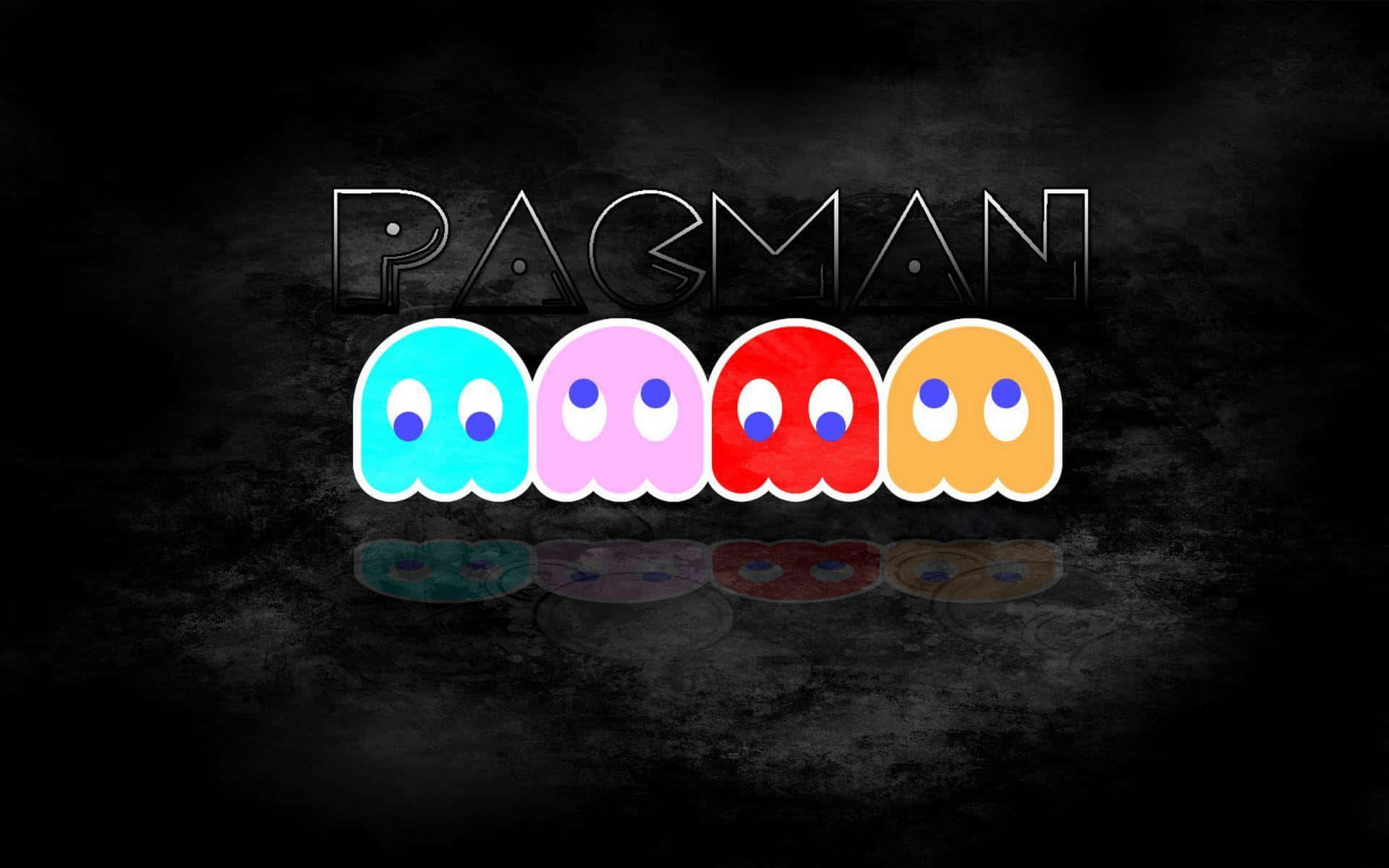 四個色彩繽紛的 Pac-Man 鬼魂在深色背景上排列成一行，上方有 PACMAN 字樣。