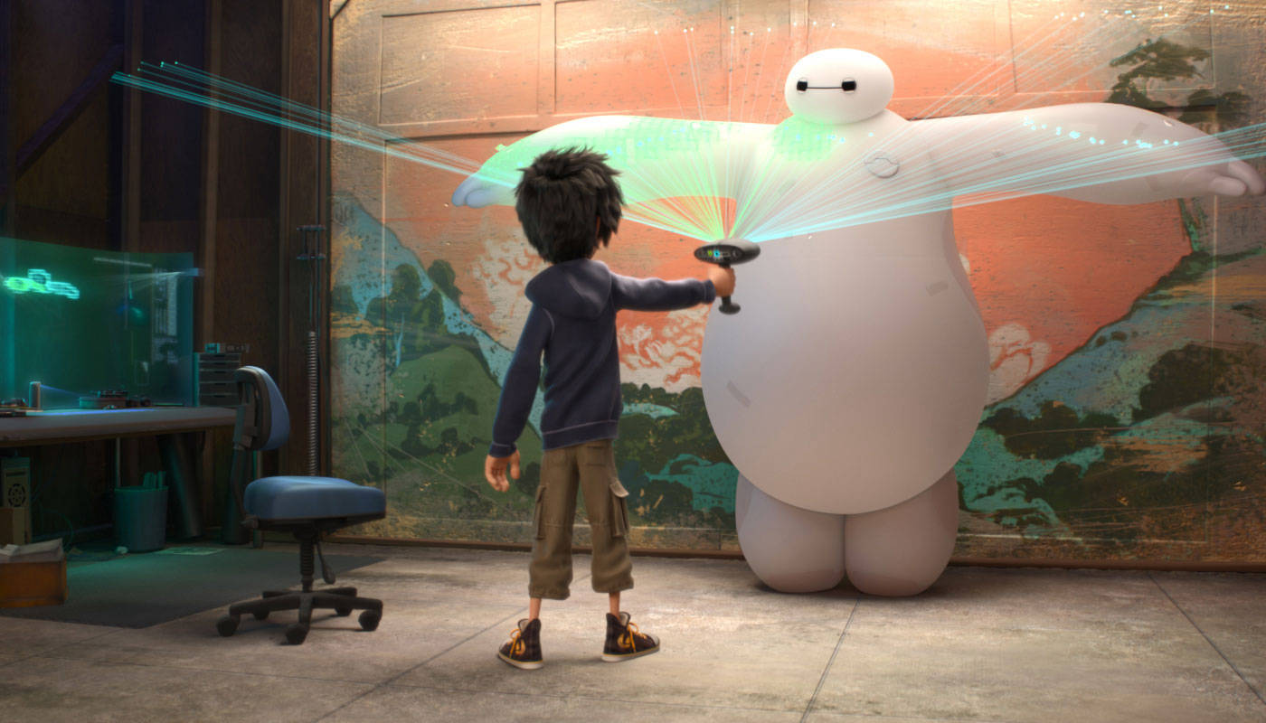掃描Baymax 壁紙 — 一個年輕男孩在工作室啟動一個發光的綠色激光投影機在一個巨大的白色充氣機械人上。