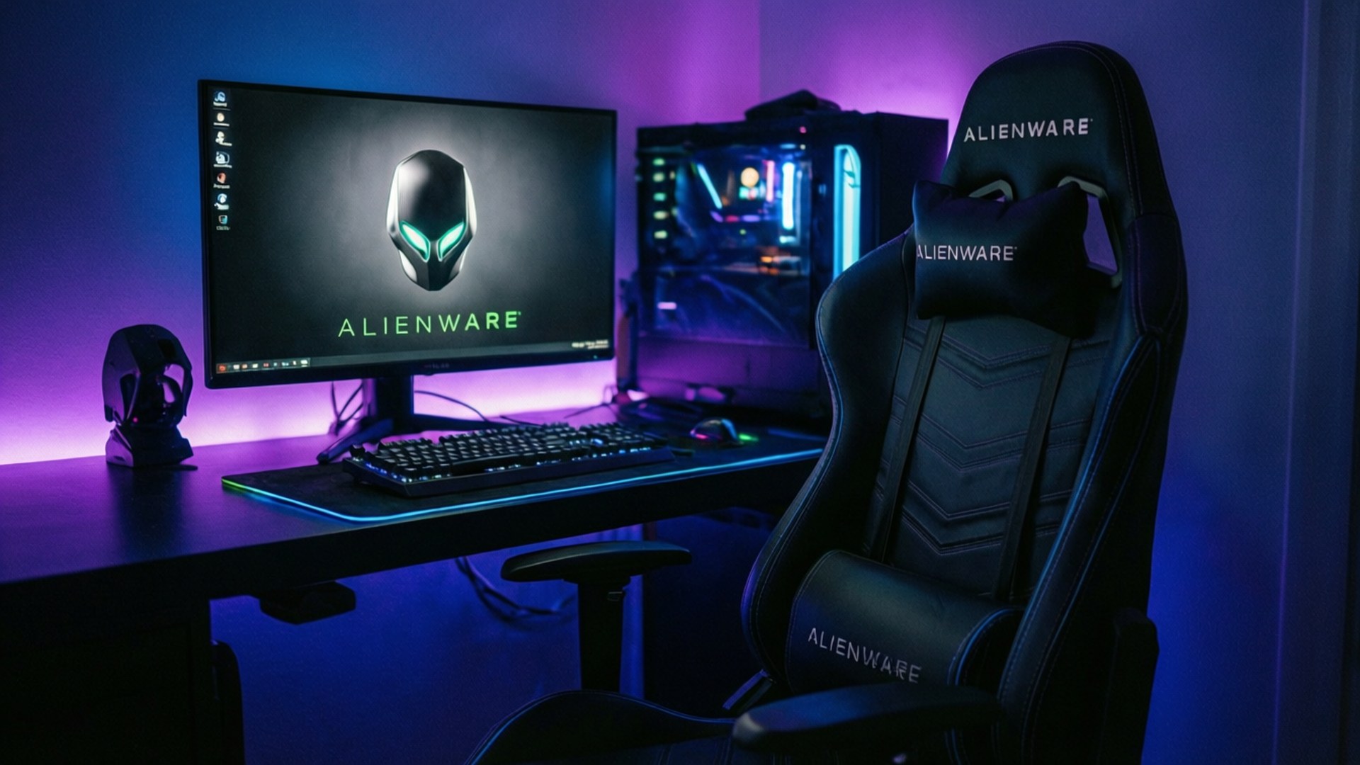 Alienware 遊戲設置，帶有發光的藍色和紫色燈光在書桌椅子、顯示器和PC上