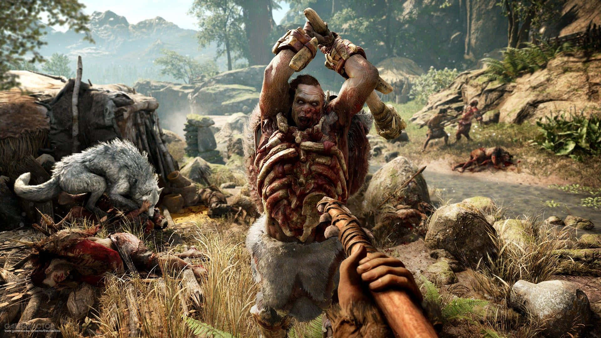 探索《Far Cry 5》的野性之地 壁紙 — 一個原始戰士在森林空地舉起棍棒，狼和倒下的敵人包圍着他。