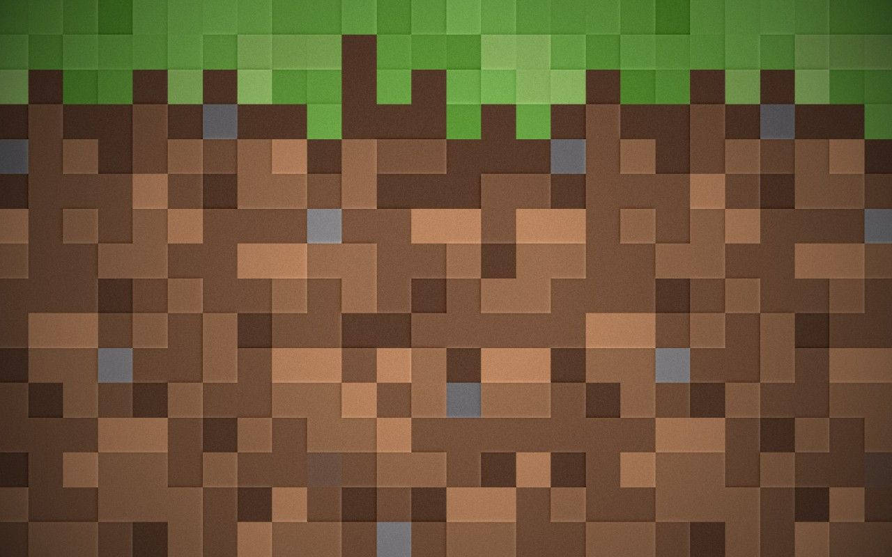 Minecraft泥土方塊，頂部有草皮，像素化風格