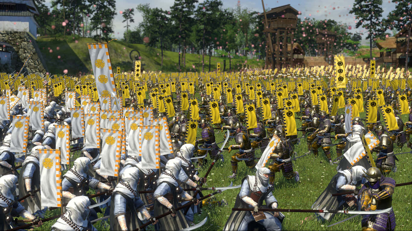 探索《Total War Shogun 2》的刺激戰略戰爭！ 壁紙 — 大規模的武士軍隊身穿精細盔甲，在晴朗的天空下穿越陽光照耀的草地。