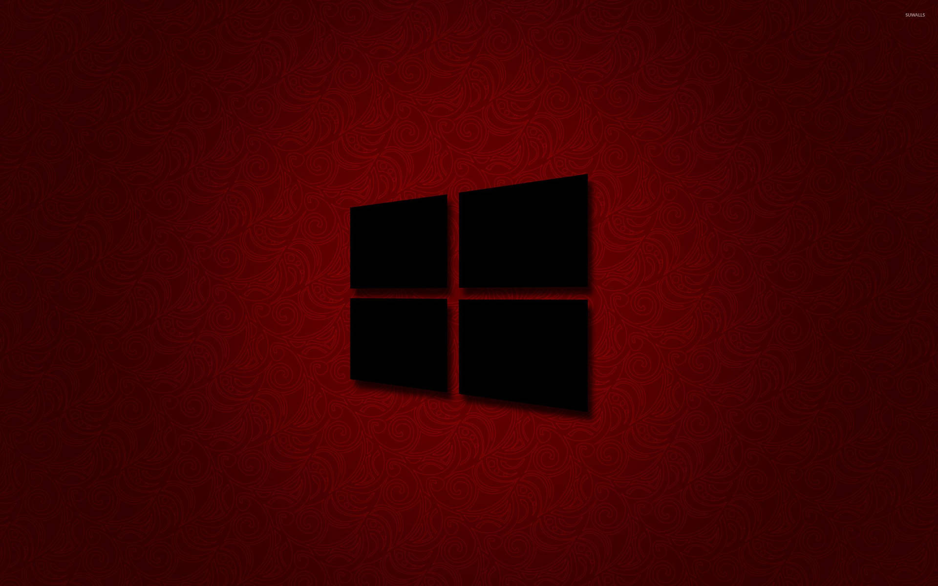 黑色Windows標誌在紅色紋理背景上