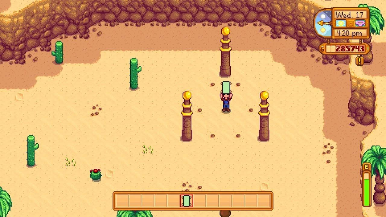 Stardew Valley 遊戲場景，顯示沙漠中有仙人掌和玩家角色在石柱附近。