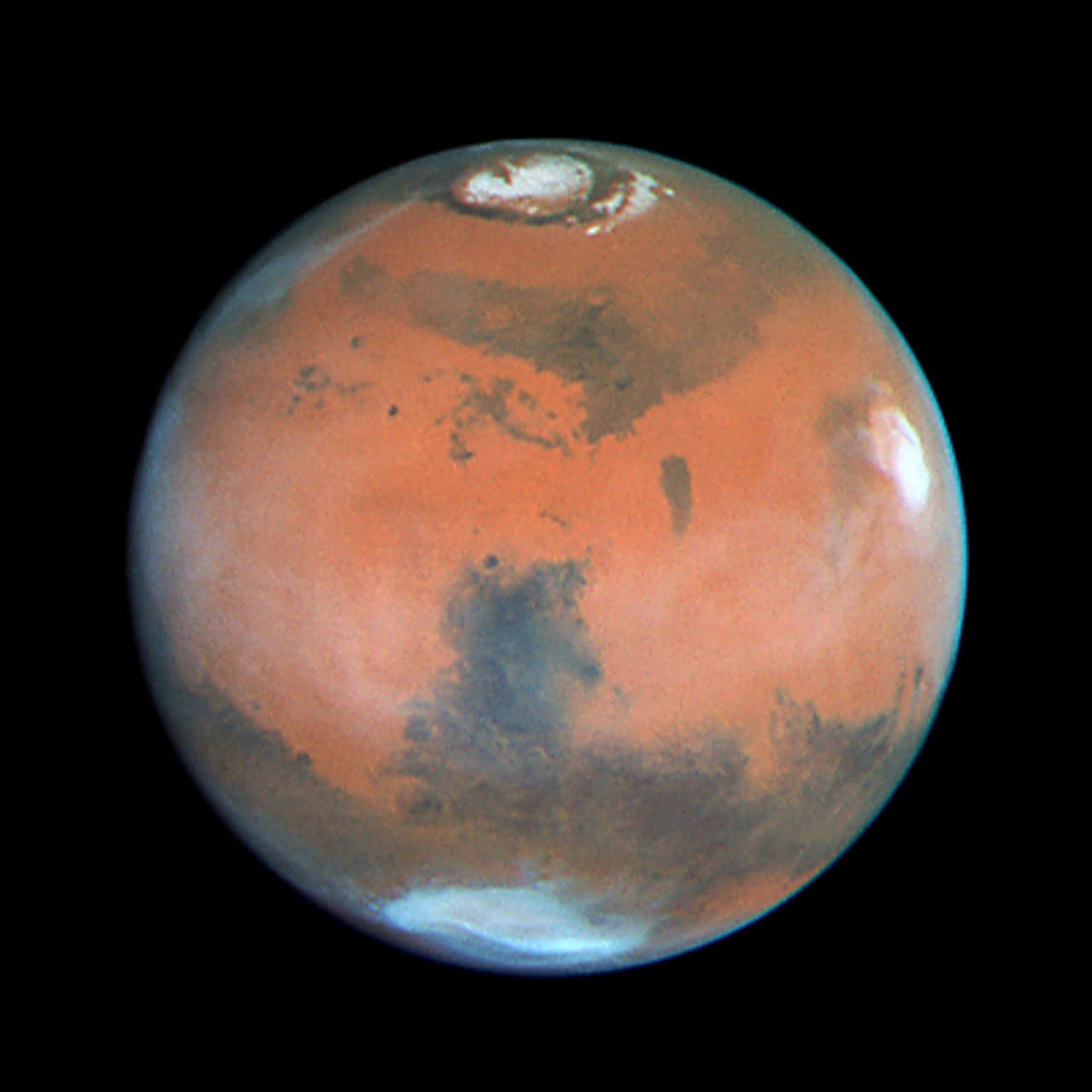 火星行星，表面呈鏽色，太空中帶有極地冰蓋。