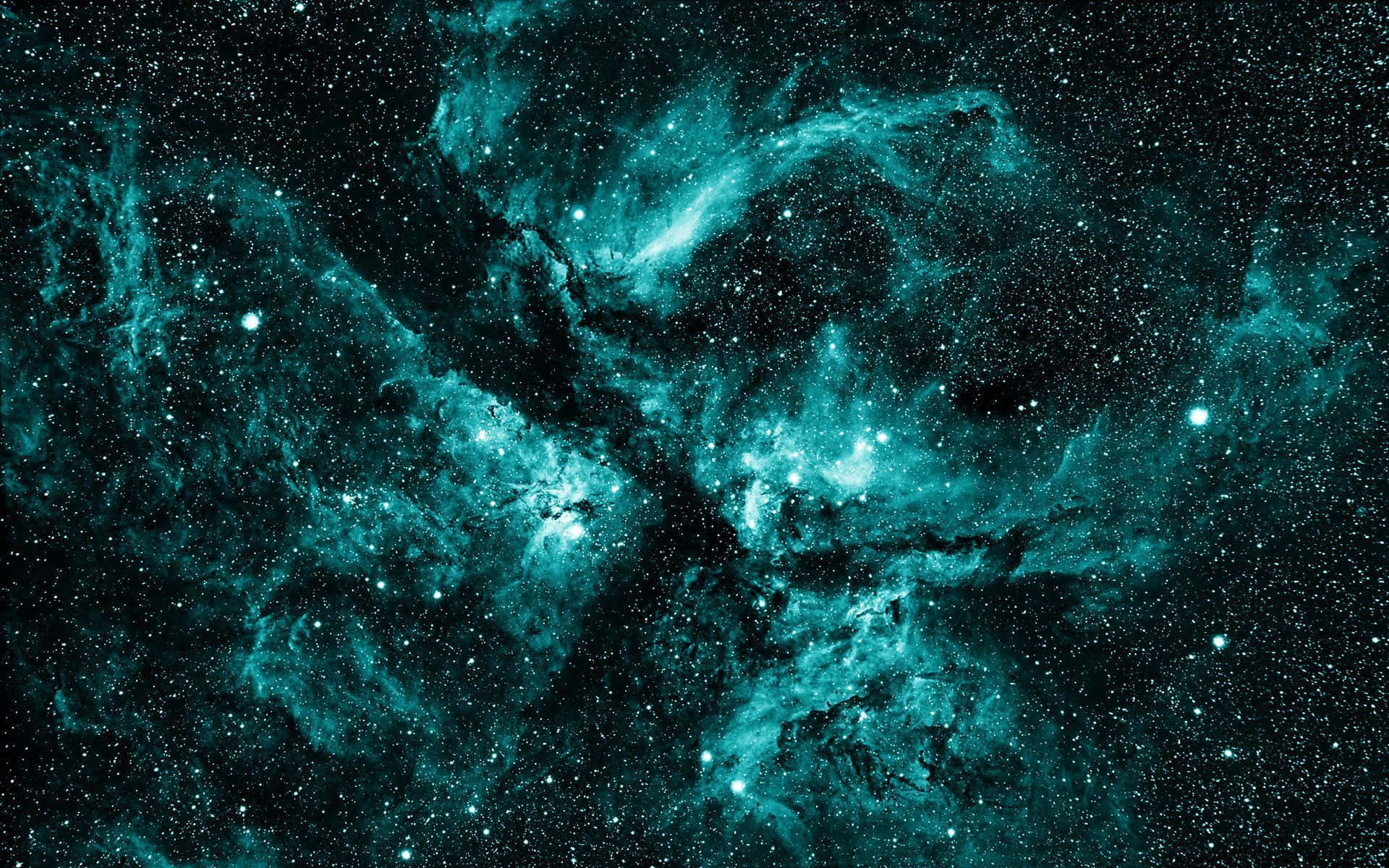 深空中有發光星星的藍綠色星雲