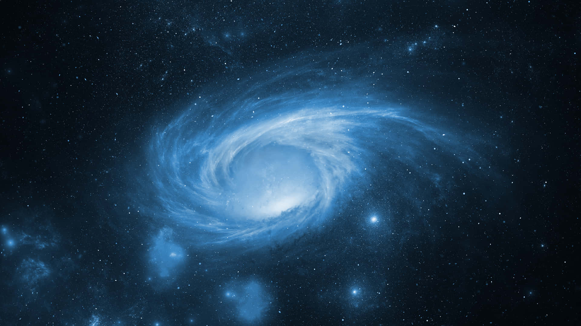 一個藍色螺旋星系，在深空中帶有旋轉的旋臂和明亮的星星。