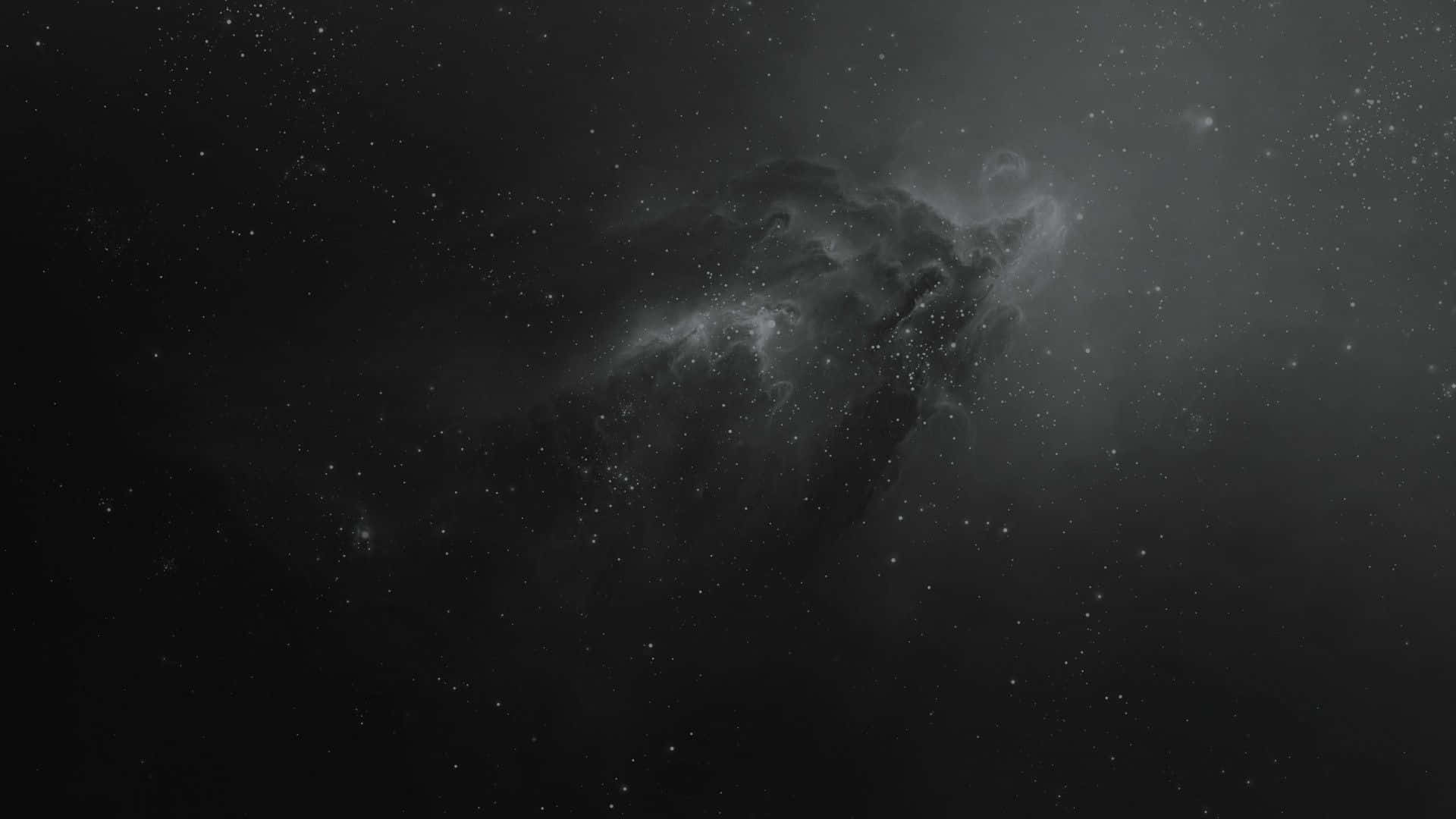 深邃太空中帶有旋轉雲霧和散落星星的黑暗宇宙星雲。
