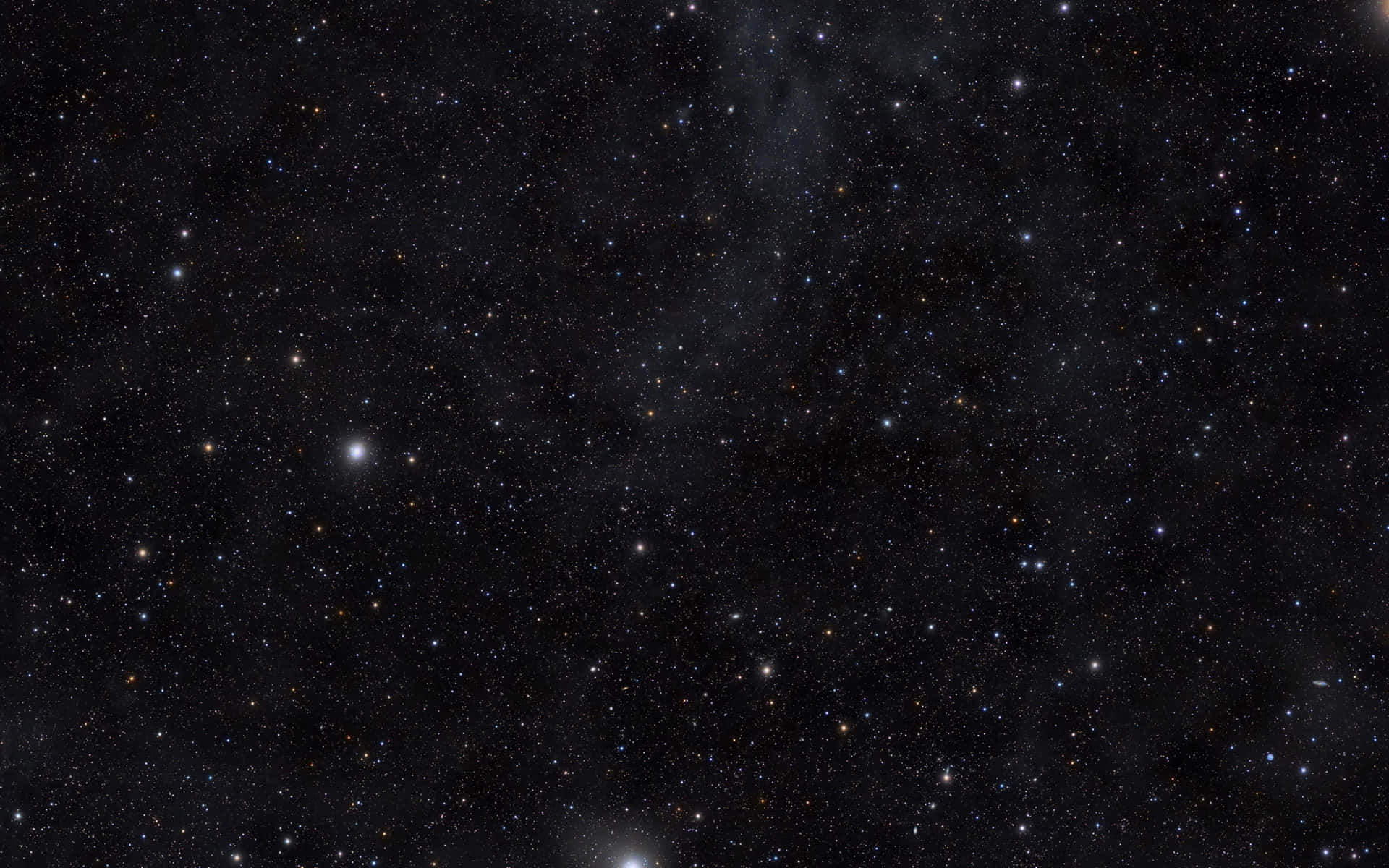 星空夜空，帶有宇宙塵埃雲和遙遠星系。