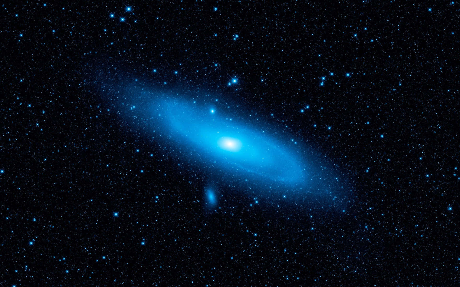 在深空中被無數星星包圍的發光藍色螺旋星系。
