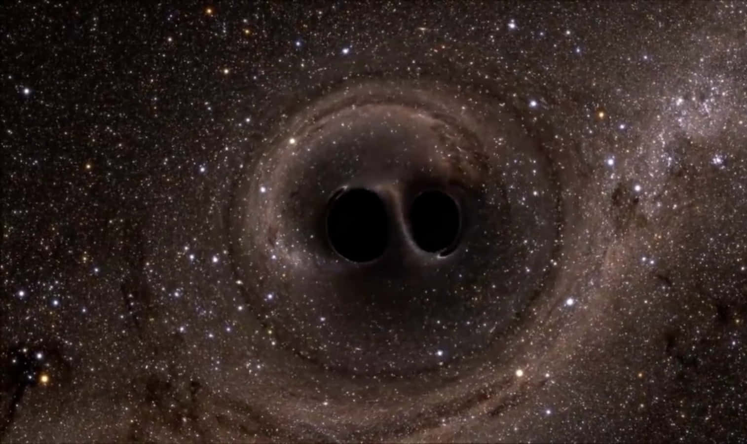 兩個黑洞在佈滿星星的宇宙場景中環繞。