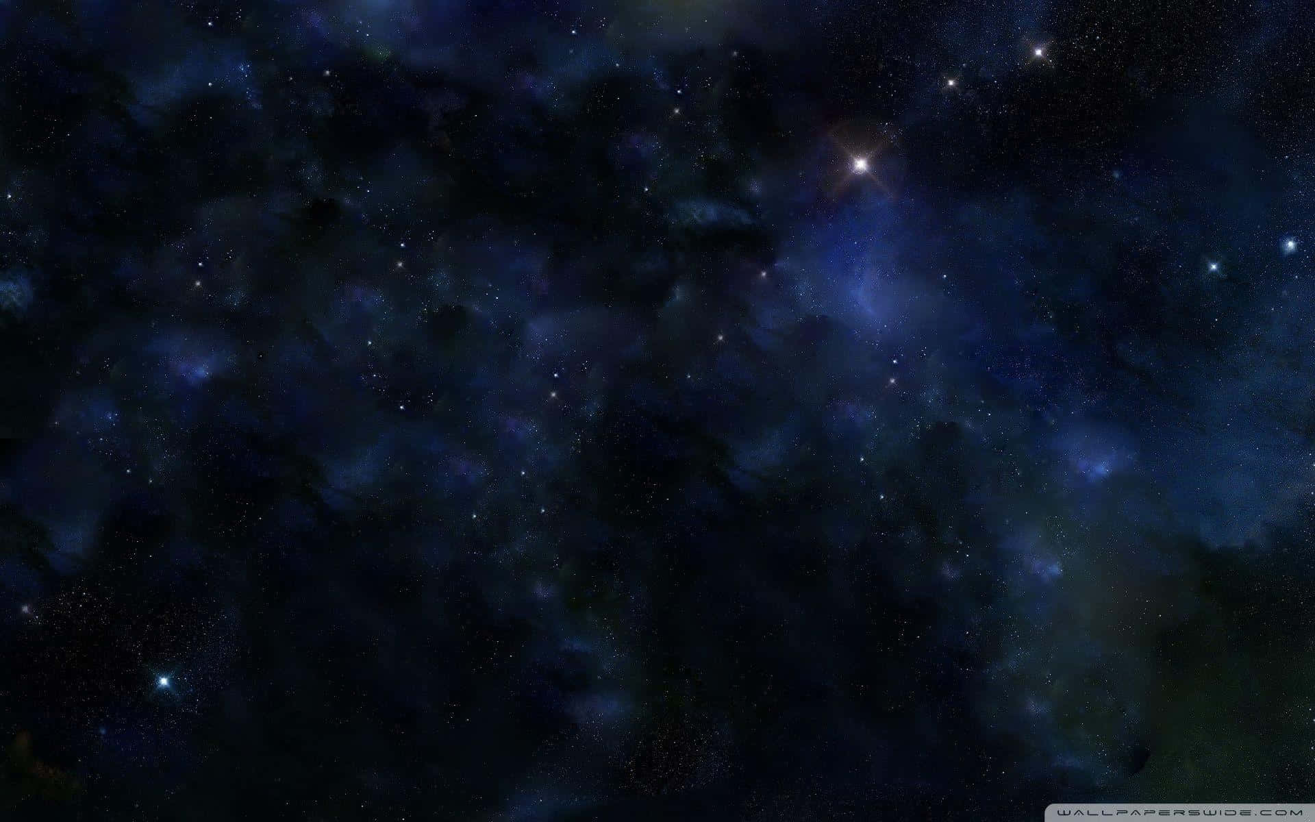 繁星點點的夜空，帶有色彩繽紛的星雲和明亮的星星。