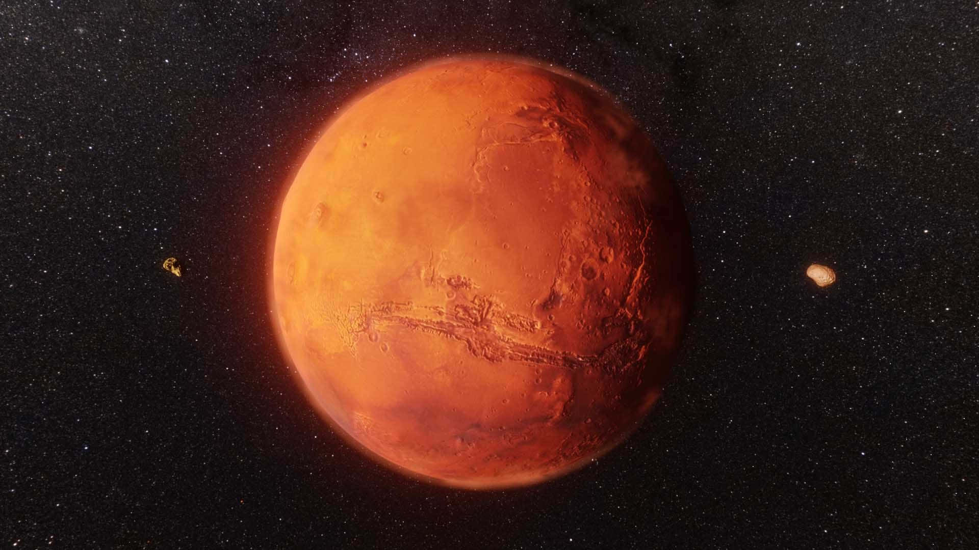 火星與兩顆衛星，背景是繁星點點的太空。
