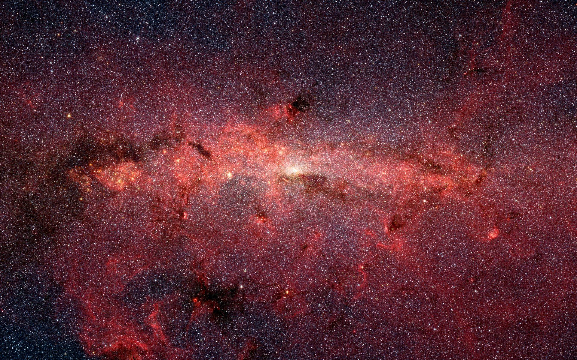 鮮豔紅色和黑色宇宙星雲，帶有發光的星星和氣體雲。
