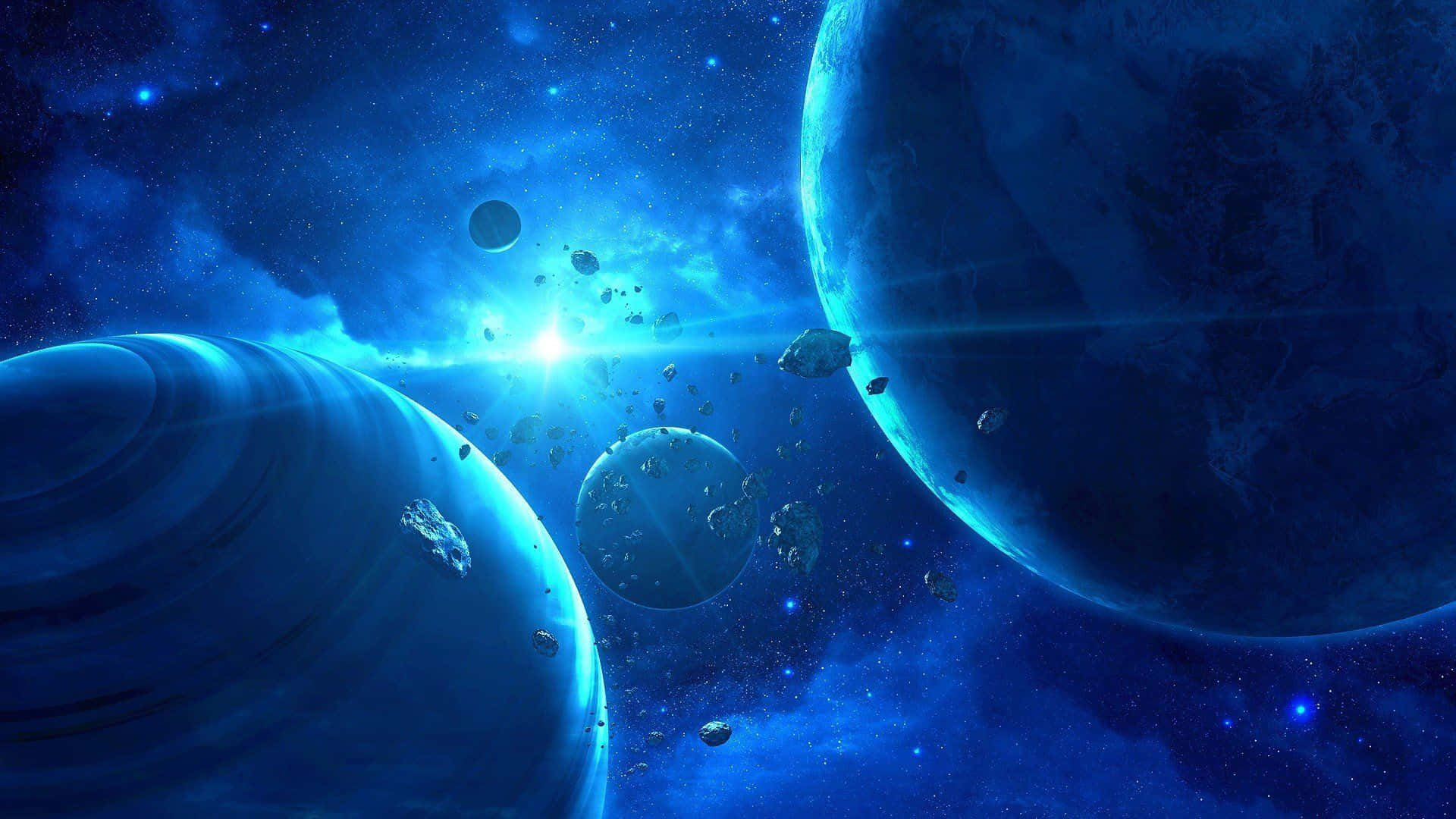 探索藍色宇宙的深邃 壁紙 — 一個宇宙場景，發光的藍色行星和小行星漂浮在星光熠熠的星雲中，沐浴在耀眼的光芒中。