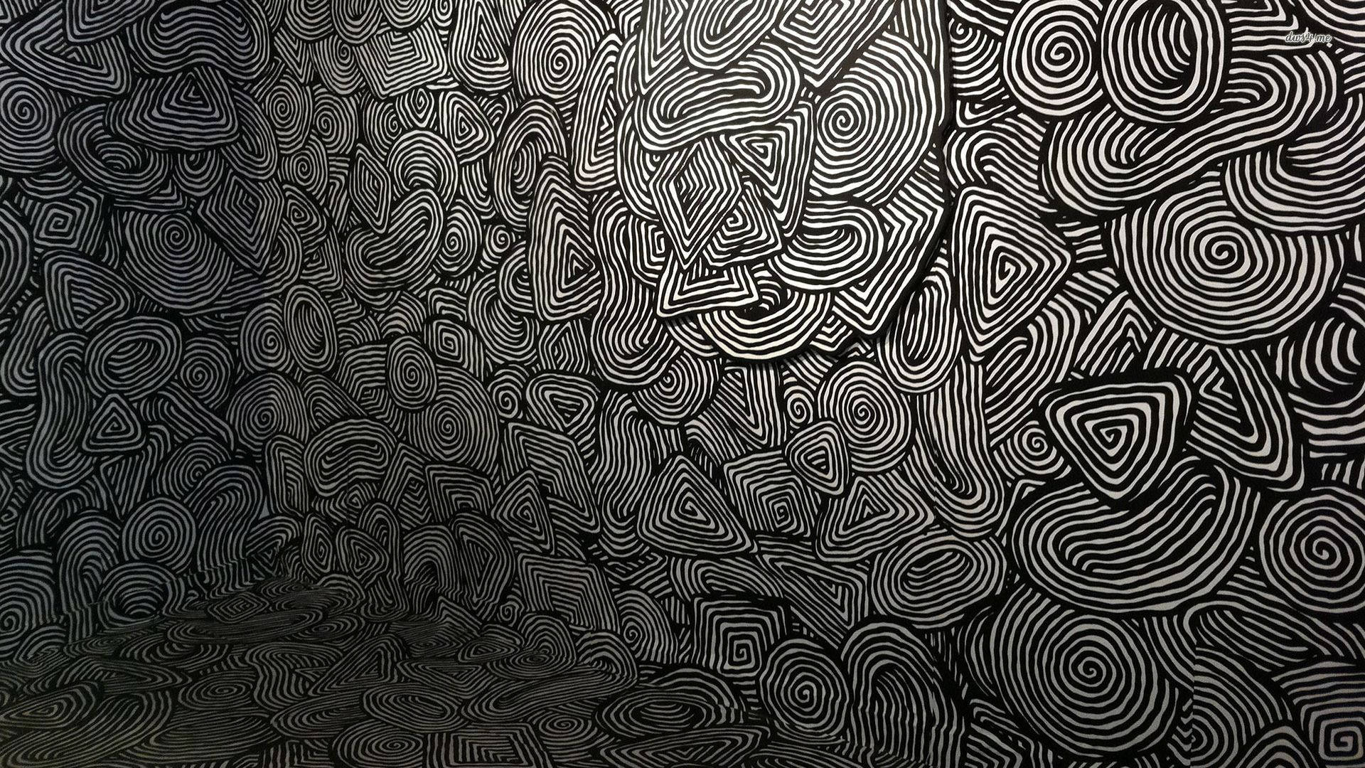 黑白抽象藝術，帶有旋轉線條和幾何形狀。