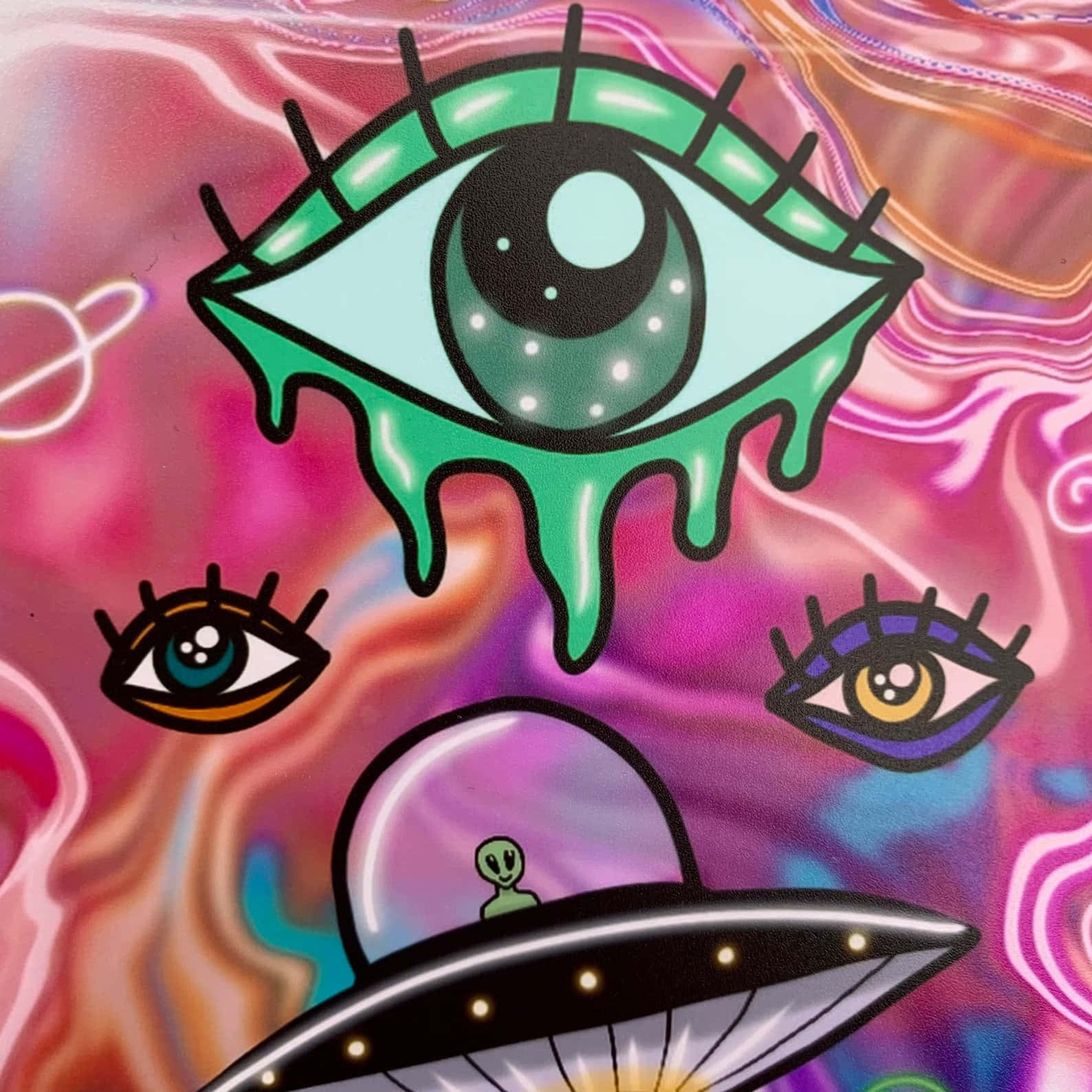 卡通UFO與外星人在宇宙漩渦中的巨大滴落眼睛下方。