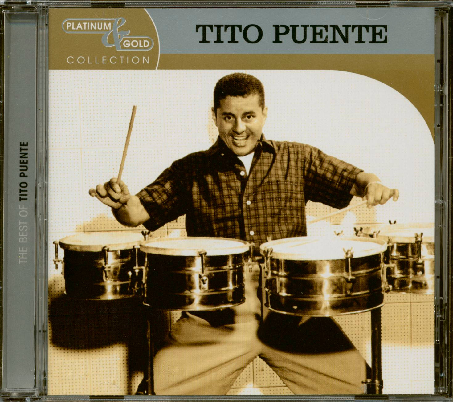 Tito Puente 喺鉑金同黃金珍藏專輯封面打康加鼓。
