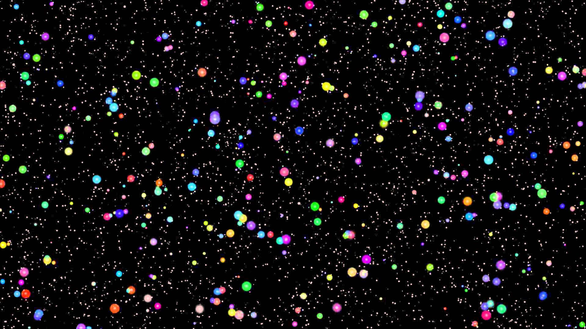 一個黑色背景，充滿了彩色發光球體和類似星星的細小白色斑點。