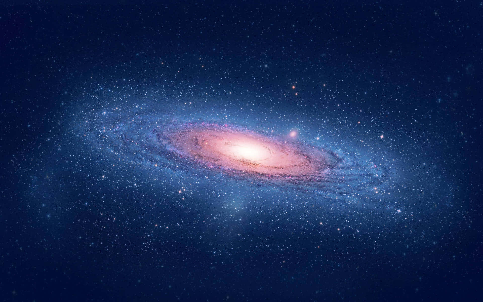 揭開深空奧秘，探索酷藍星系 壁紙 — 一個令人驚嘆的螺旋星系，在深邃的星空夜空中散發出粉紅色和藍色的光芒。
