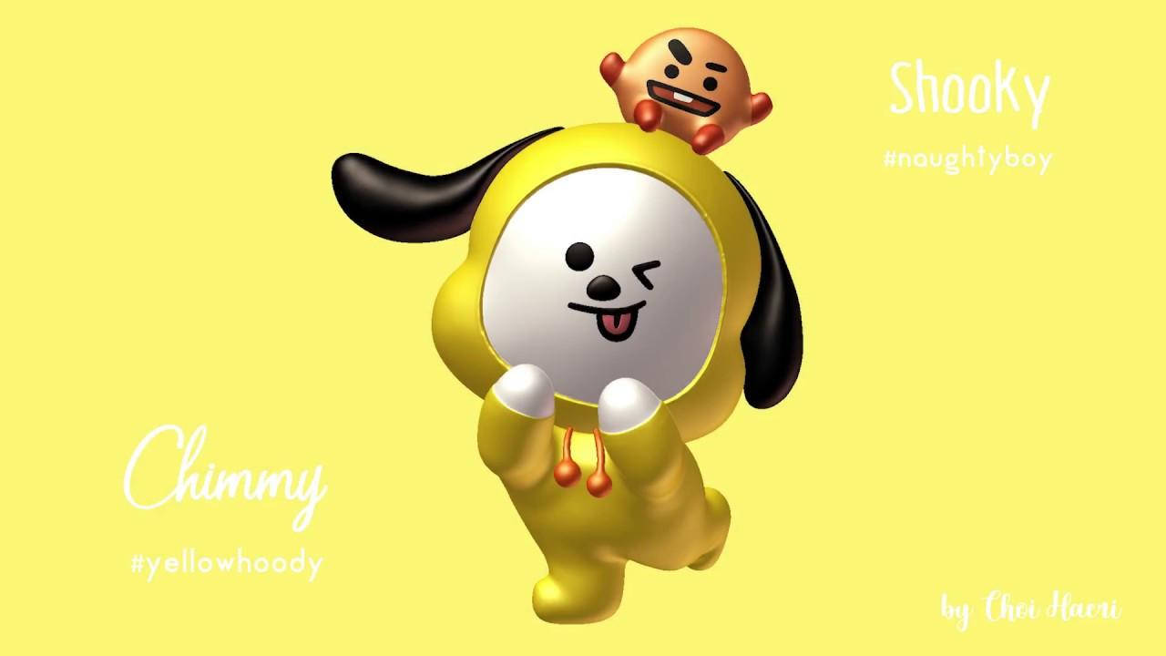 搖搖與奇米 BT21 壁紙 — 一隻快樂的黃色卡通狗，有黑色耳朵和眨眼的表情，頭上頂著一個小橙色角色，背景是純黃色。