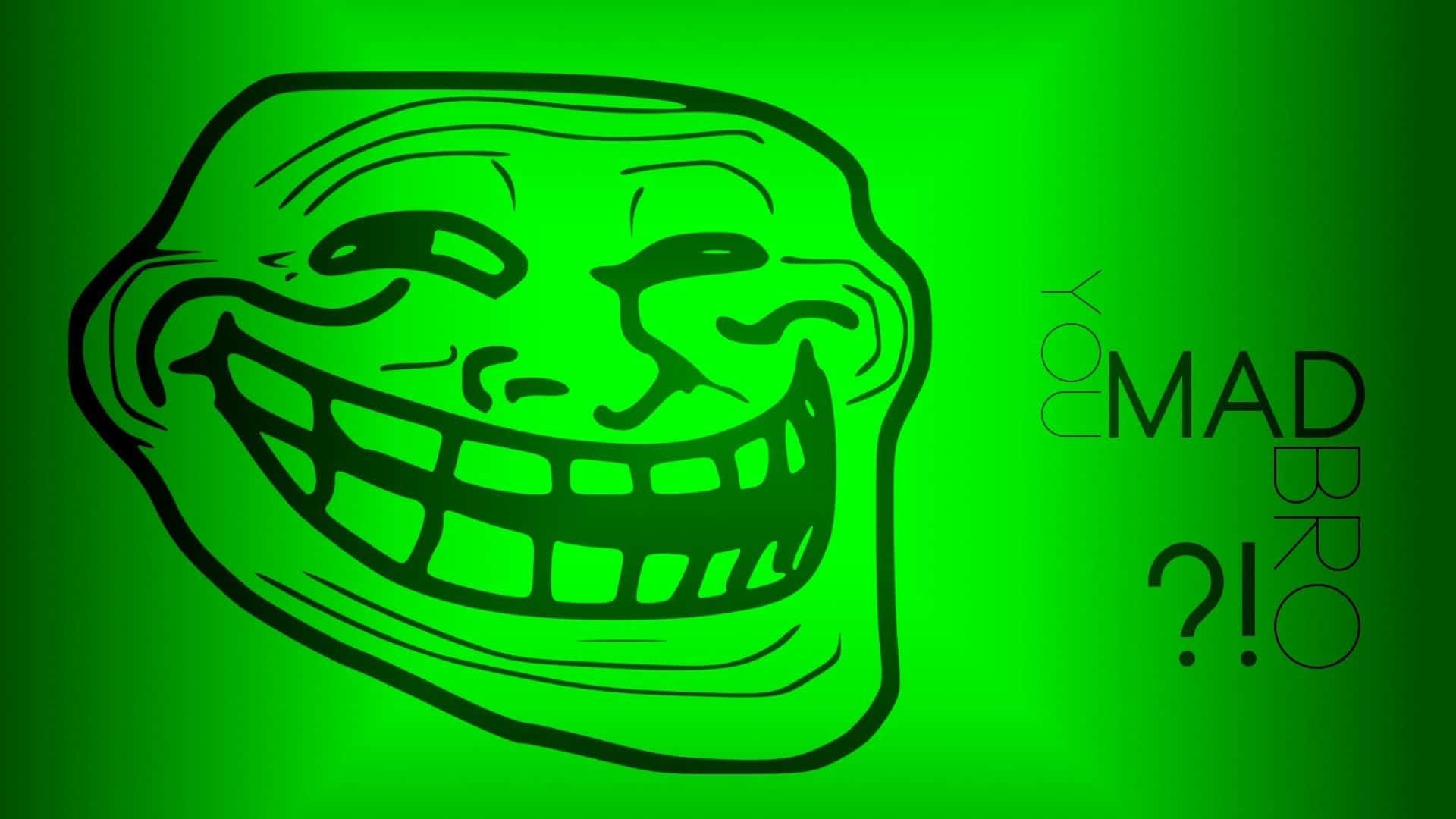 一個卡通 troll 臉，咧嘴大笑，並帶有文字 'You mad bro?!'