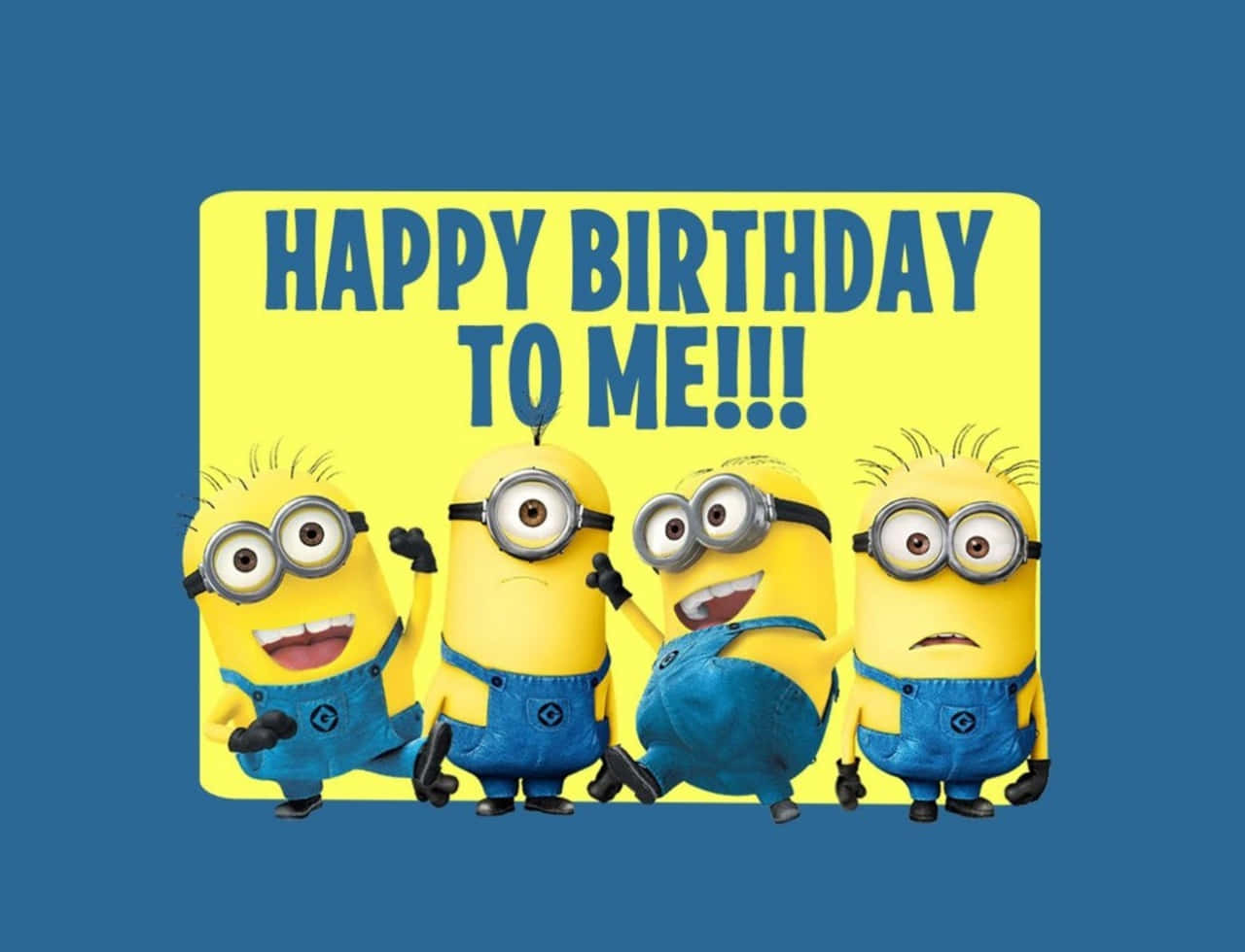 四個Minions用開心嘅標語牌慶祝生日。