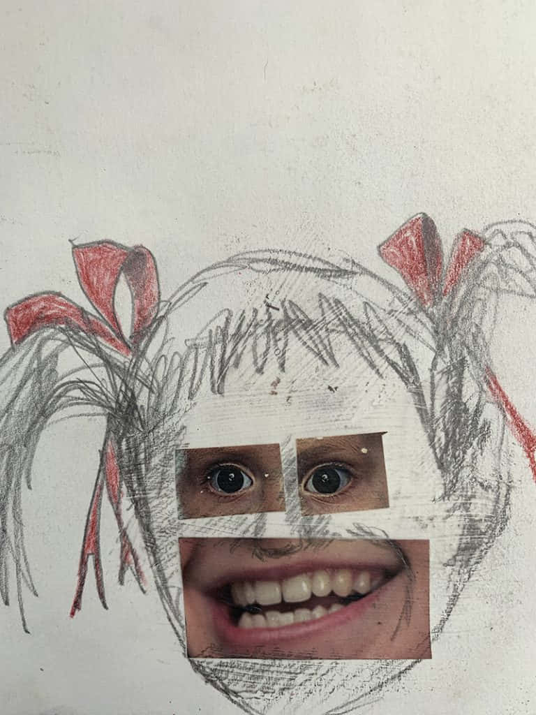 兒童臉部繪畫，使用照片眼睛和嘴巴，笑容燦爛。