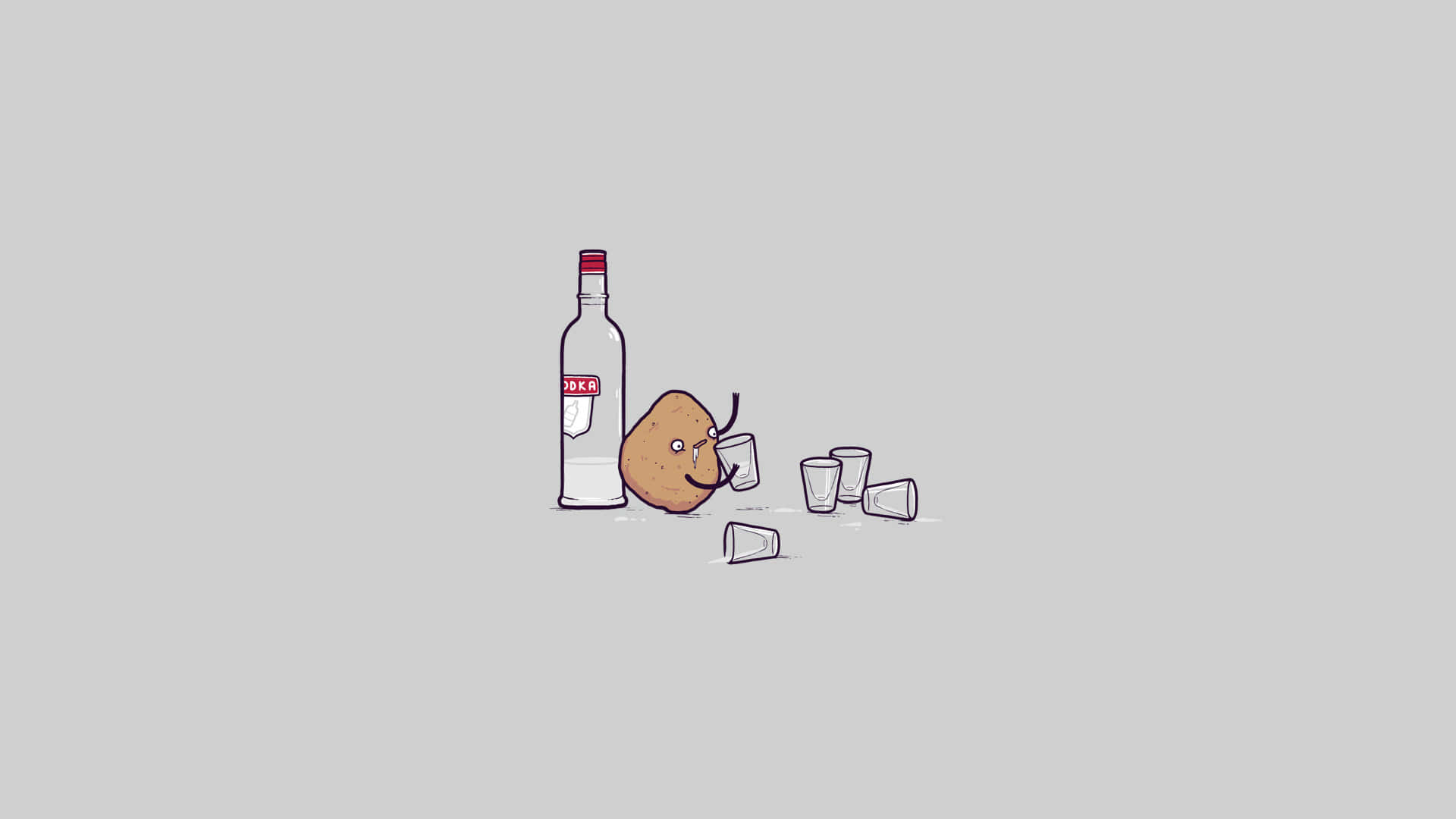一個微笑的薯仔旁邊有一瓶伏特加酒和倒下的烈酒杯。