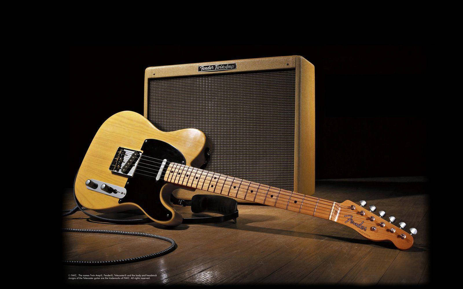 錄音室木地板上的復古Fender Telecaster結他和擴音器。 — 吉他 壁紙