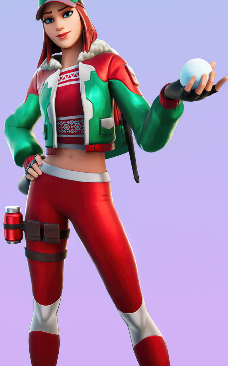 搭配Ruby Fortnite皮膚探索Outlands！ 壁紙 — 一個風格化的女性遊戲玩家，穿著紅綠色冬季裝備，在柔和的紫色背景前拿著雪球。
