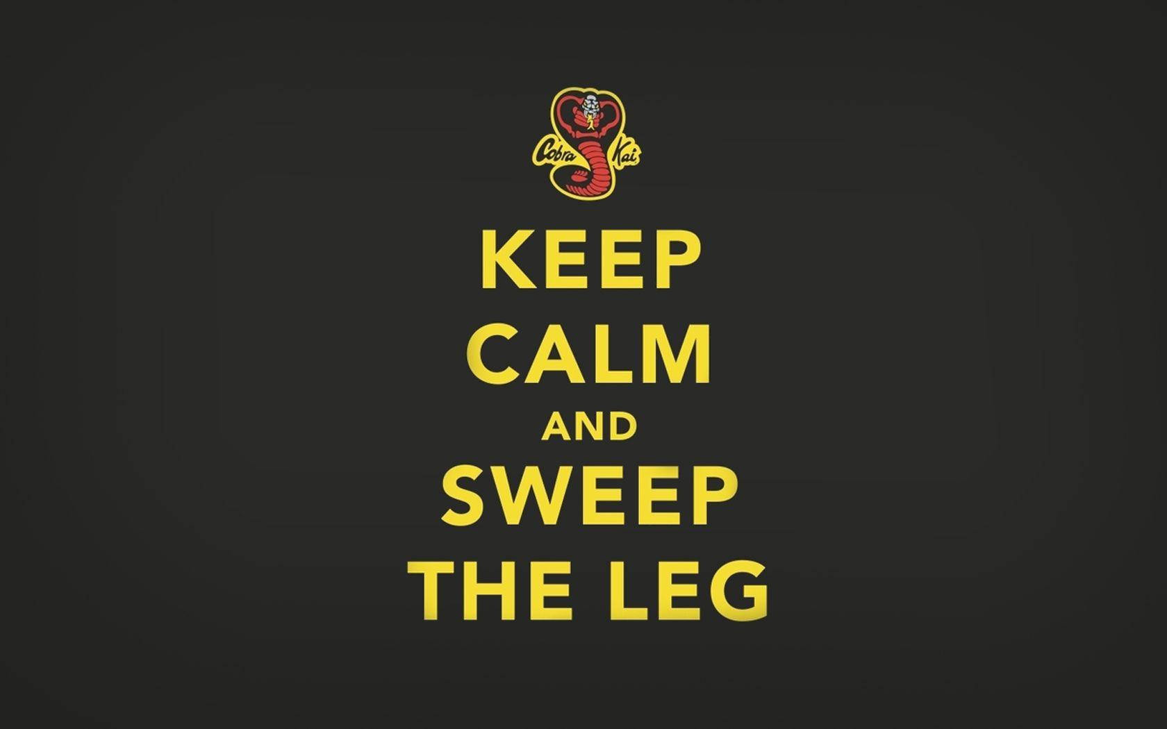 眼鏡蛇標誌與「Keep calm and sweep the leg」文字，深色背景