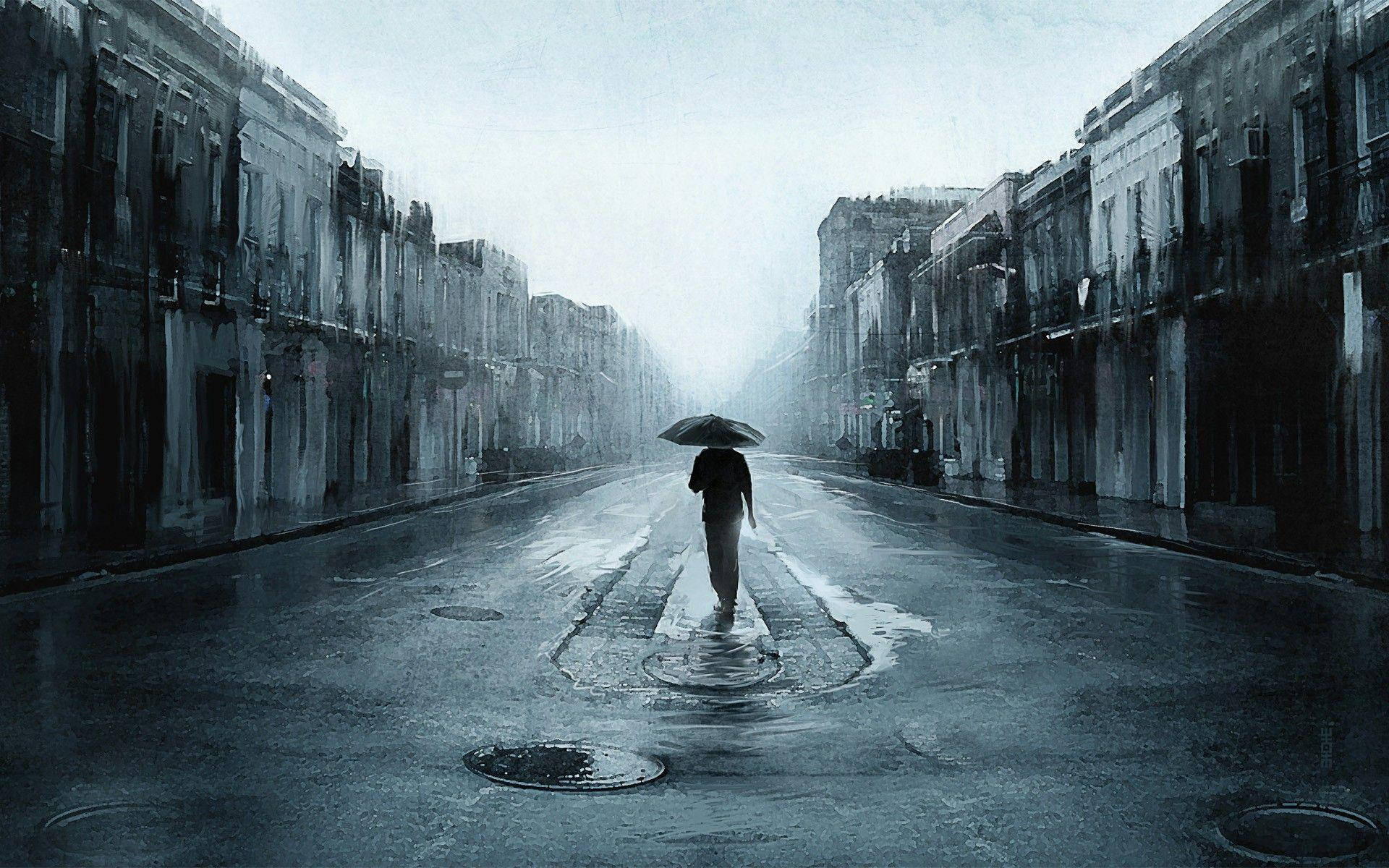 一個人在雨中撐著雨傘獨自走在空無一人的城市街道上。