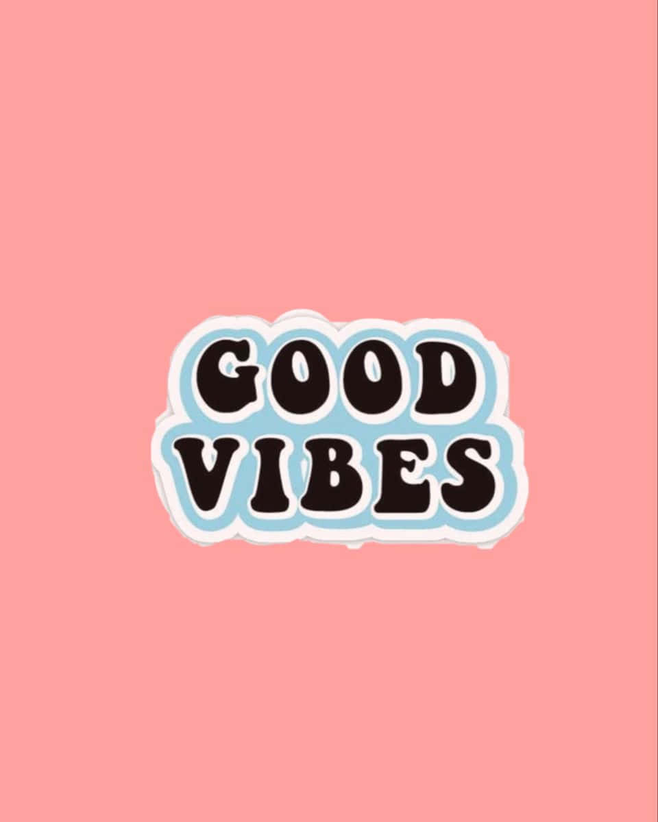 貼紙，粉色背景上印有粗體黑色文字 good vibes