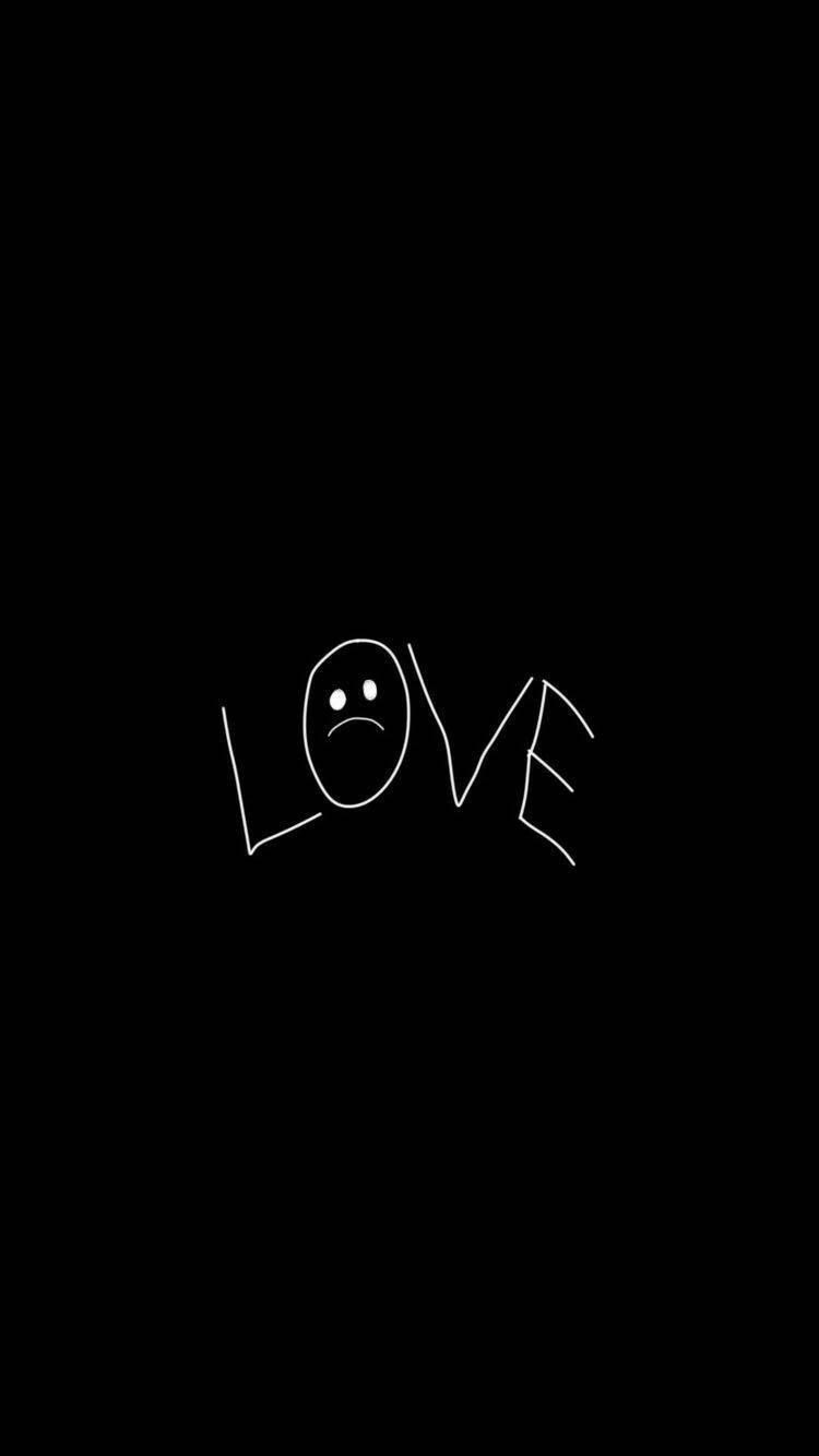 黑色背景上以白色繪製的 LOVE 字樣，帶有悲傷的表情。