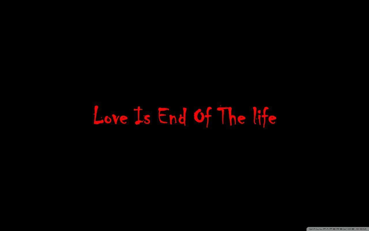 黑色背景上的紅色手寫文字寫著 Love Is End Of The life。