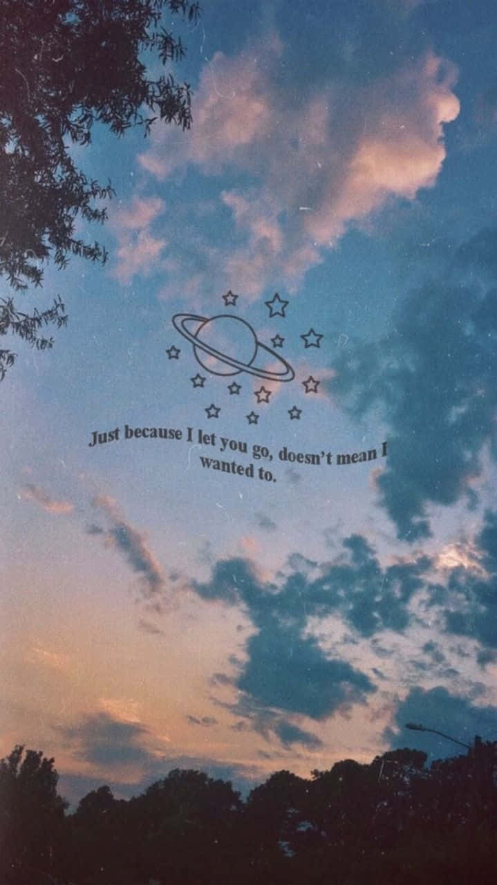 黃昏天空，有樹木和一句關於放手的 quote， surrounded by stars and a planet.