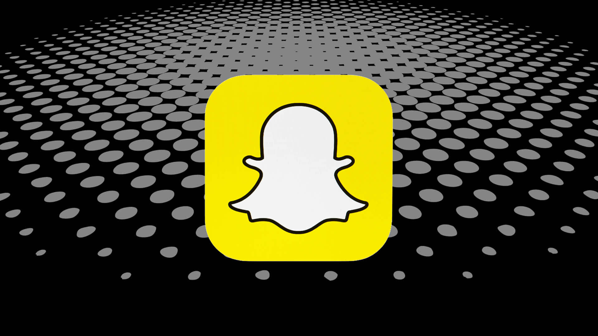 Snapchat應用程式標誌，帶有鬼魂圖示，背景為圓點